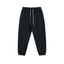 IDLT joggers, black front.