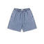 IDLT denim shorts, light blue front.
