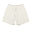 IDLT sweat shorts, cream front.