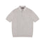 IDLT cable knit polo, beige front.
