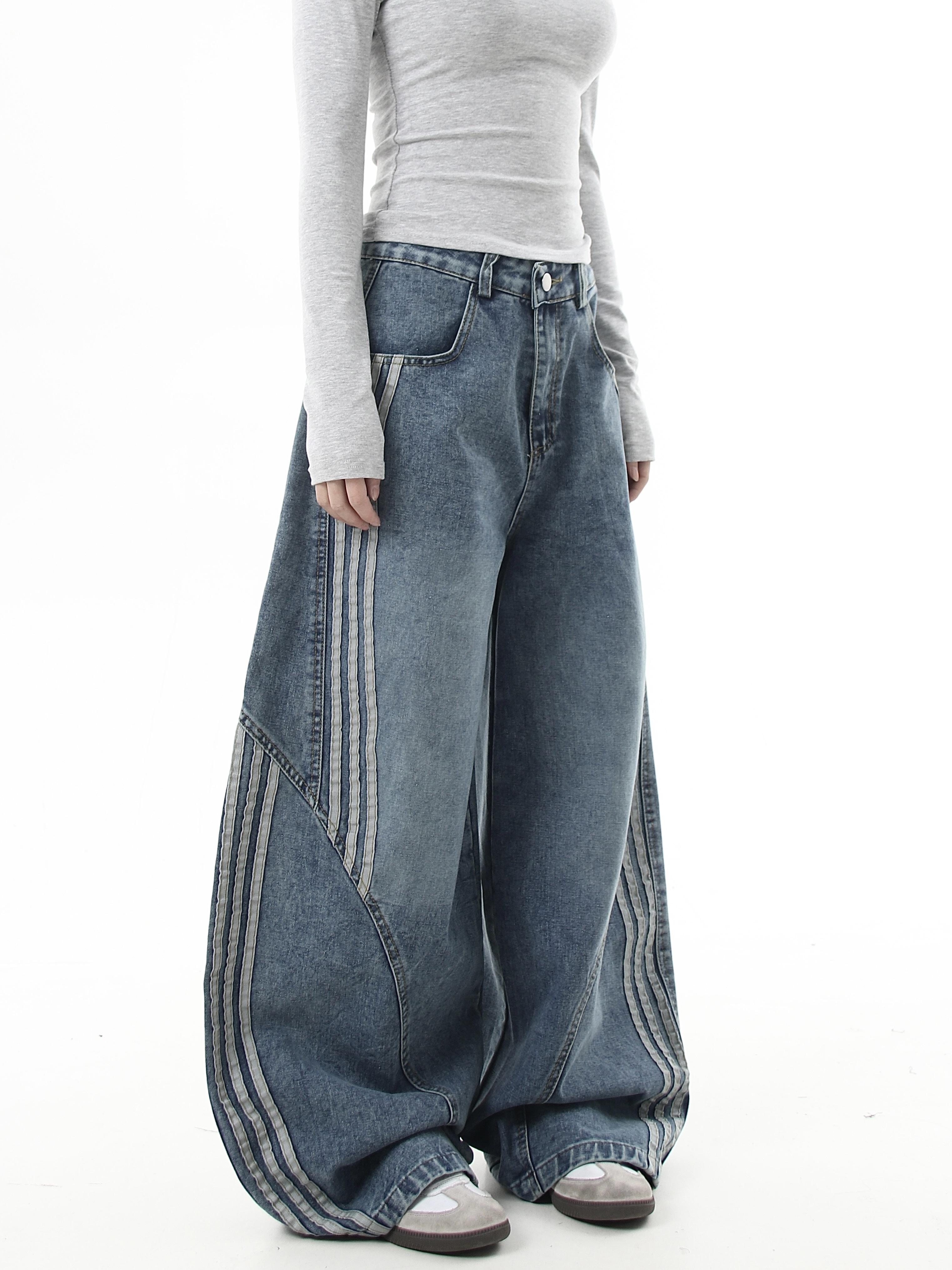 Deconstructed Triple‑Stripe Wide‑Leg Jeans
