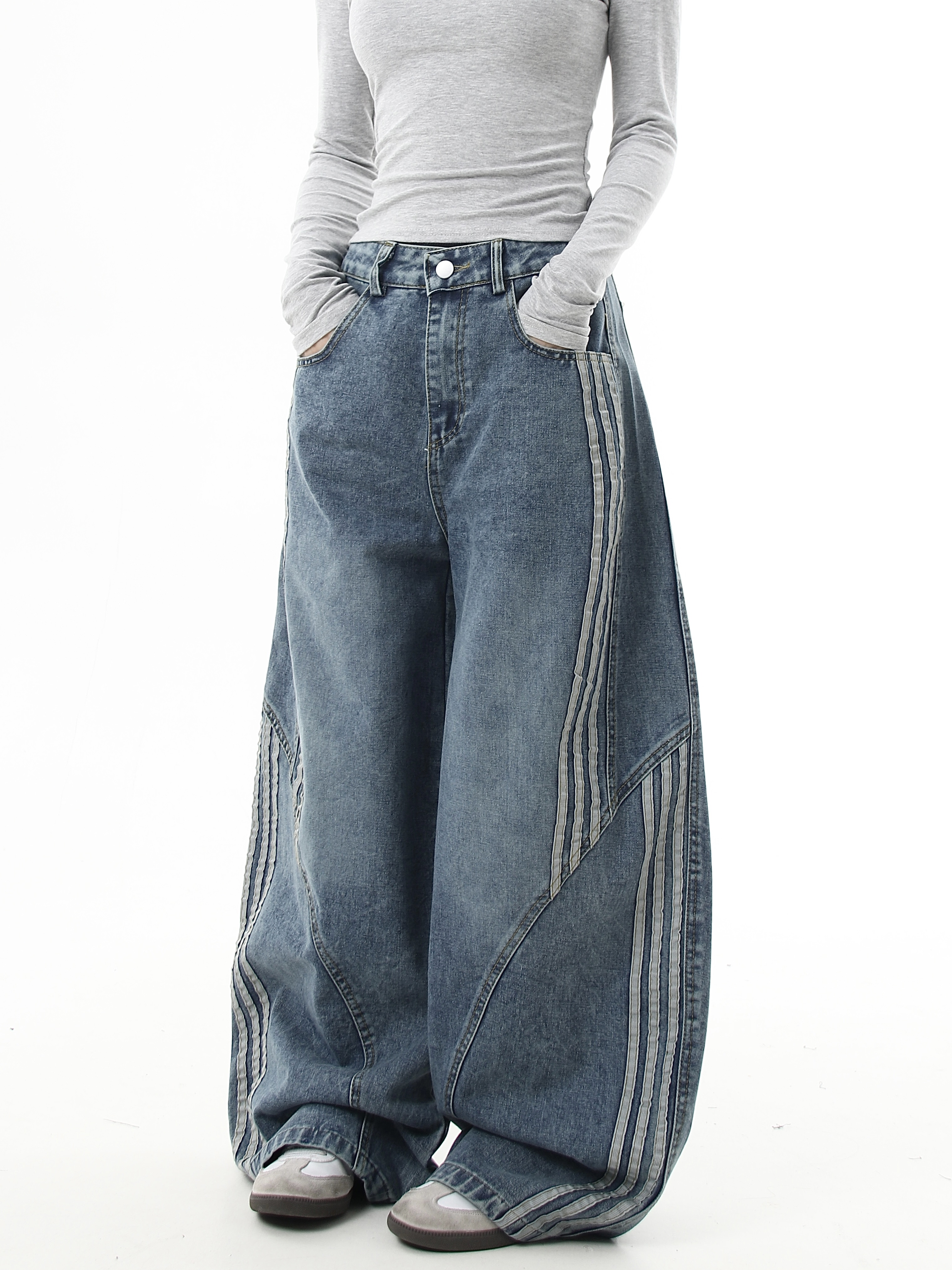Deconstructed Triple‑Stripe Wide‑Leg Jeans