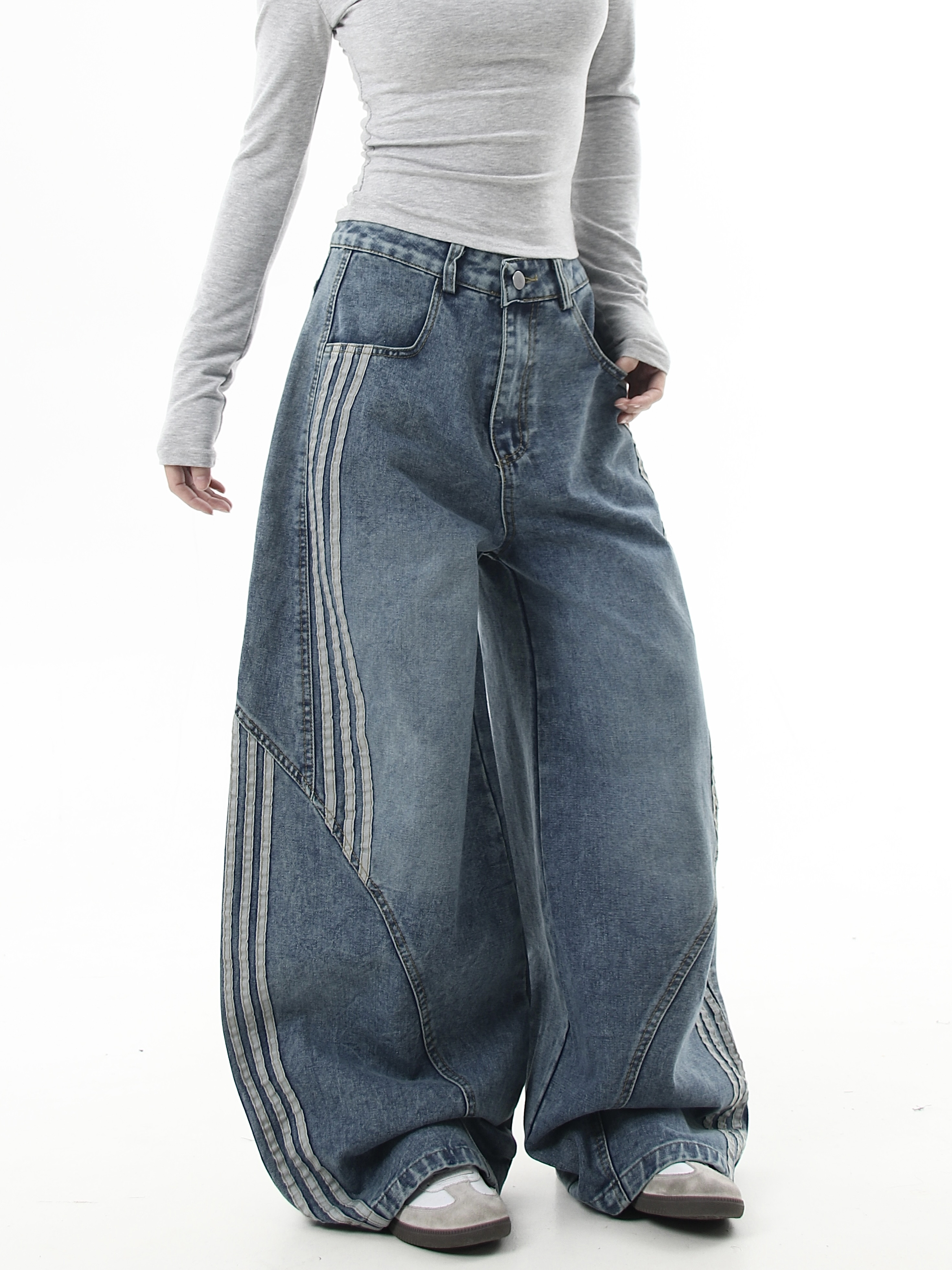 Deconstructed Triple‑Stripe Wide‑Leg Jeans
