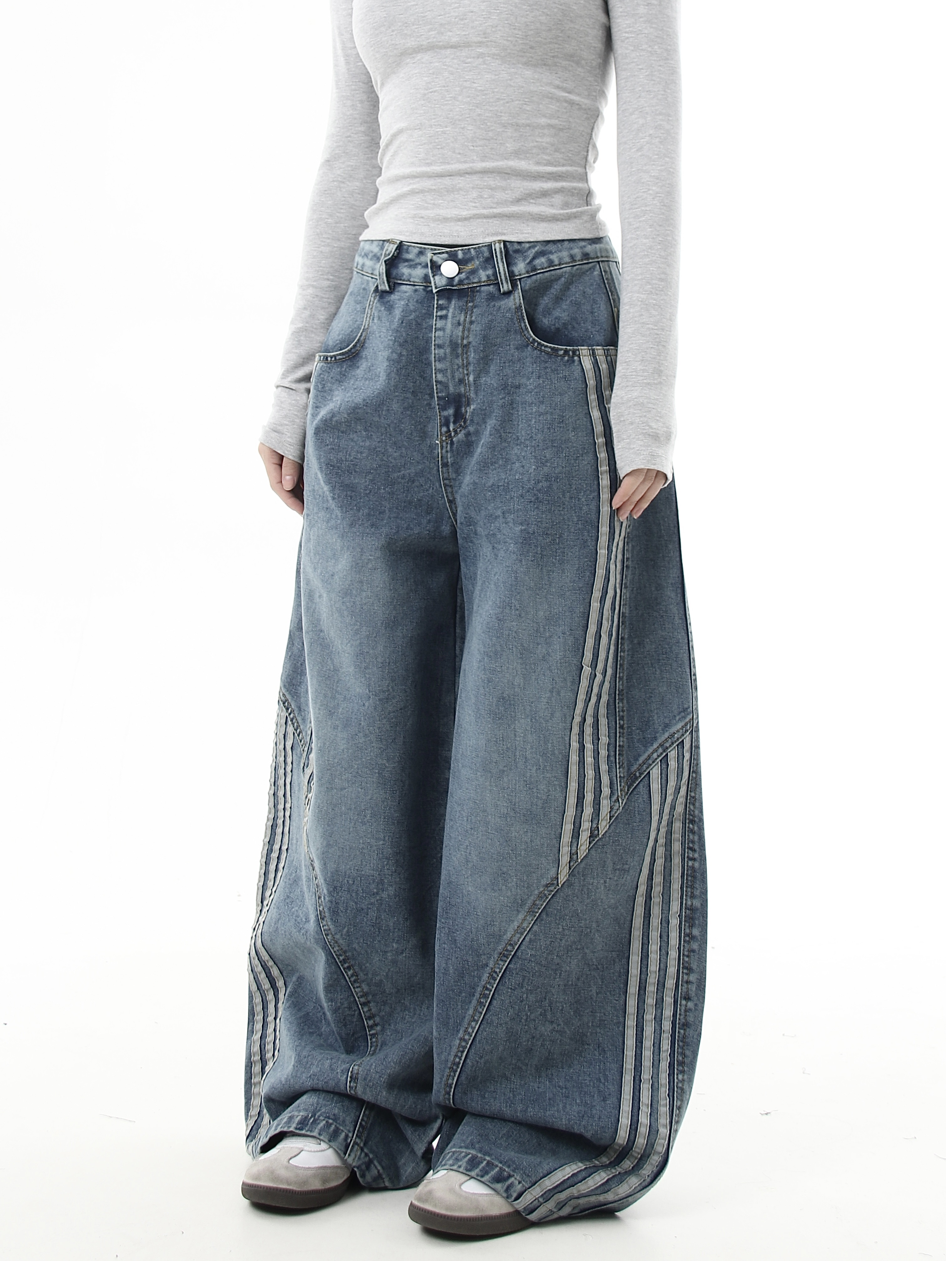 Deconstructed Triple‑Stripe Wide‑Leg Jeans