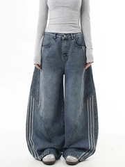Deconstructed Triple‑Stripe Wide‑Leg Jeans