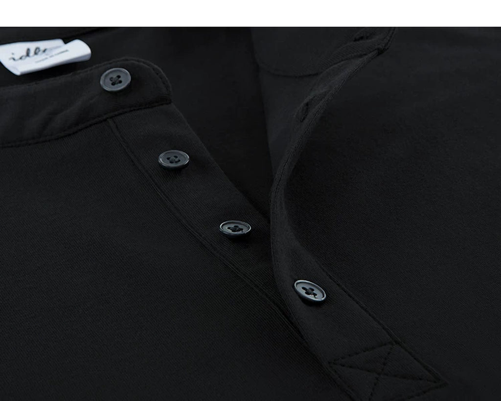 IDLT long sleeve henley, black button placket close-up.