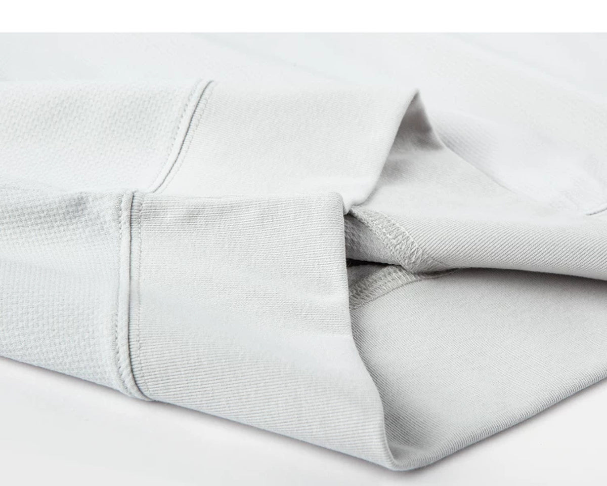IDLT short sleeve sweatshirt, light gray ribbed hem.