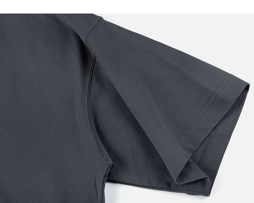 IDLT short sleeve sweatshirt, dark gray sleeve.