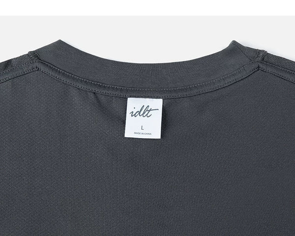 IDLT short sleeve sweatshirt, dark gray back neckline with label.