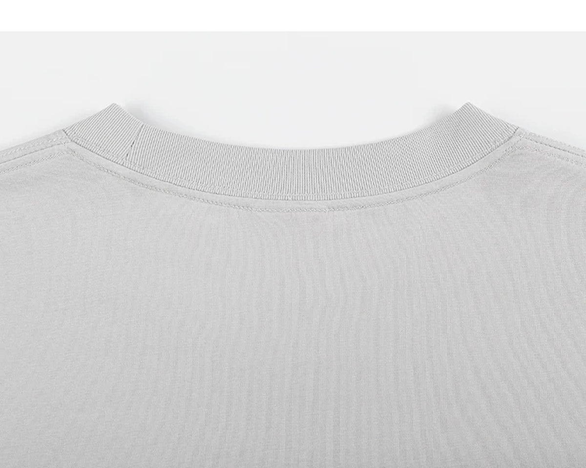 IDLT T-shirt, light gray back neckline.