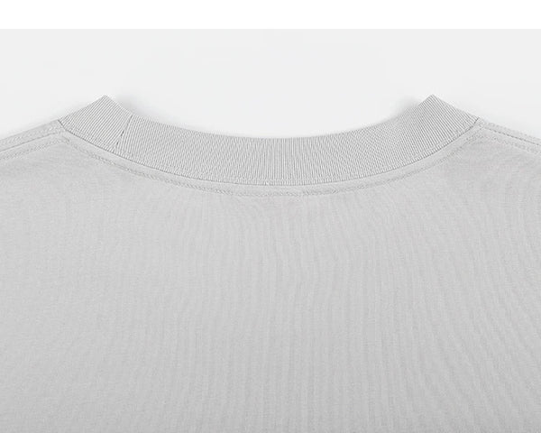 IDLT T-shirt, light gray back neckline.