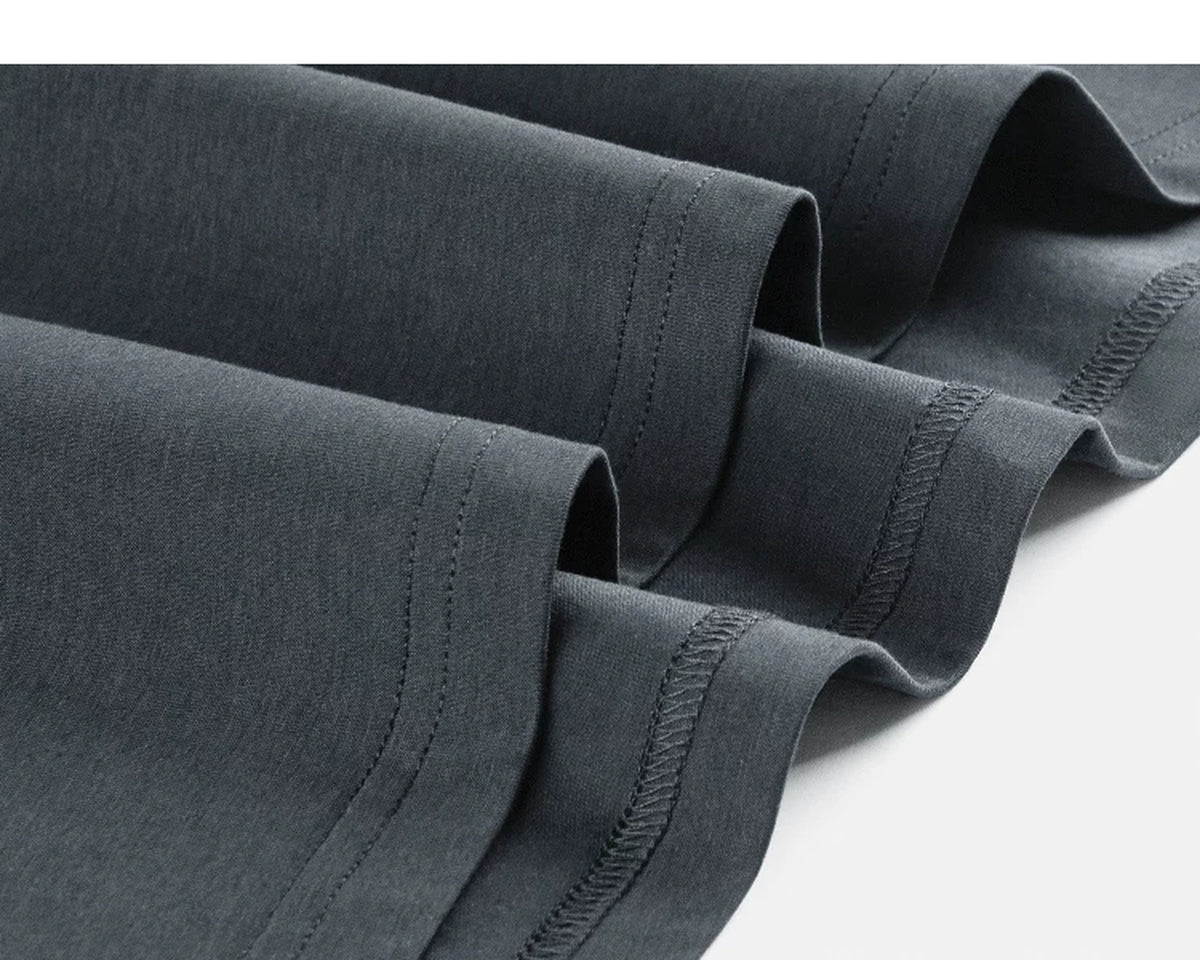 IDLT T-shirt, dark gray hem stitching close-up.