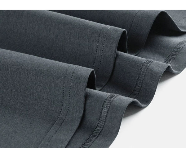 IDLT T-shirt, dark gray hem stitching close-up.