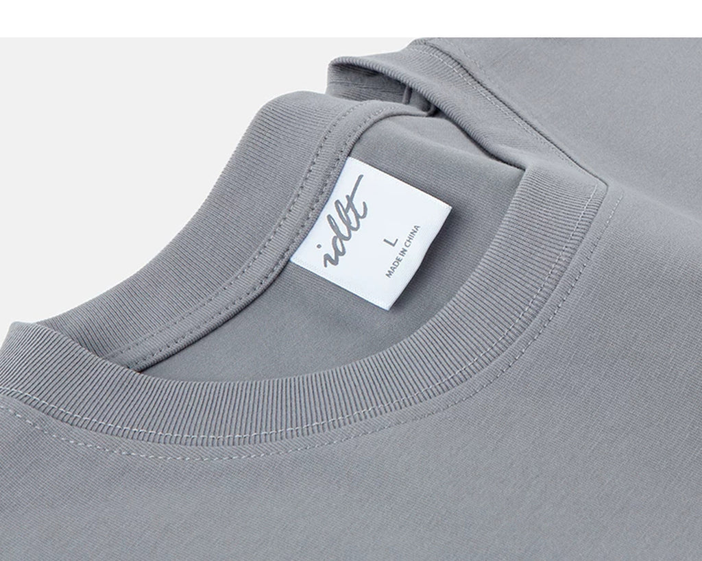 IDLT T-shirt, gray neckline and label.
