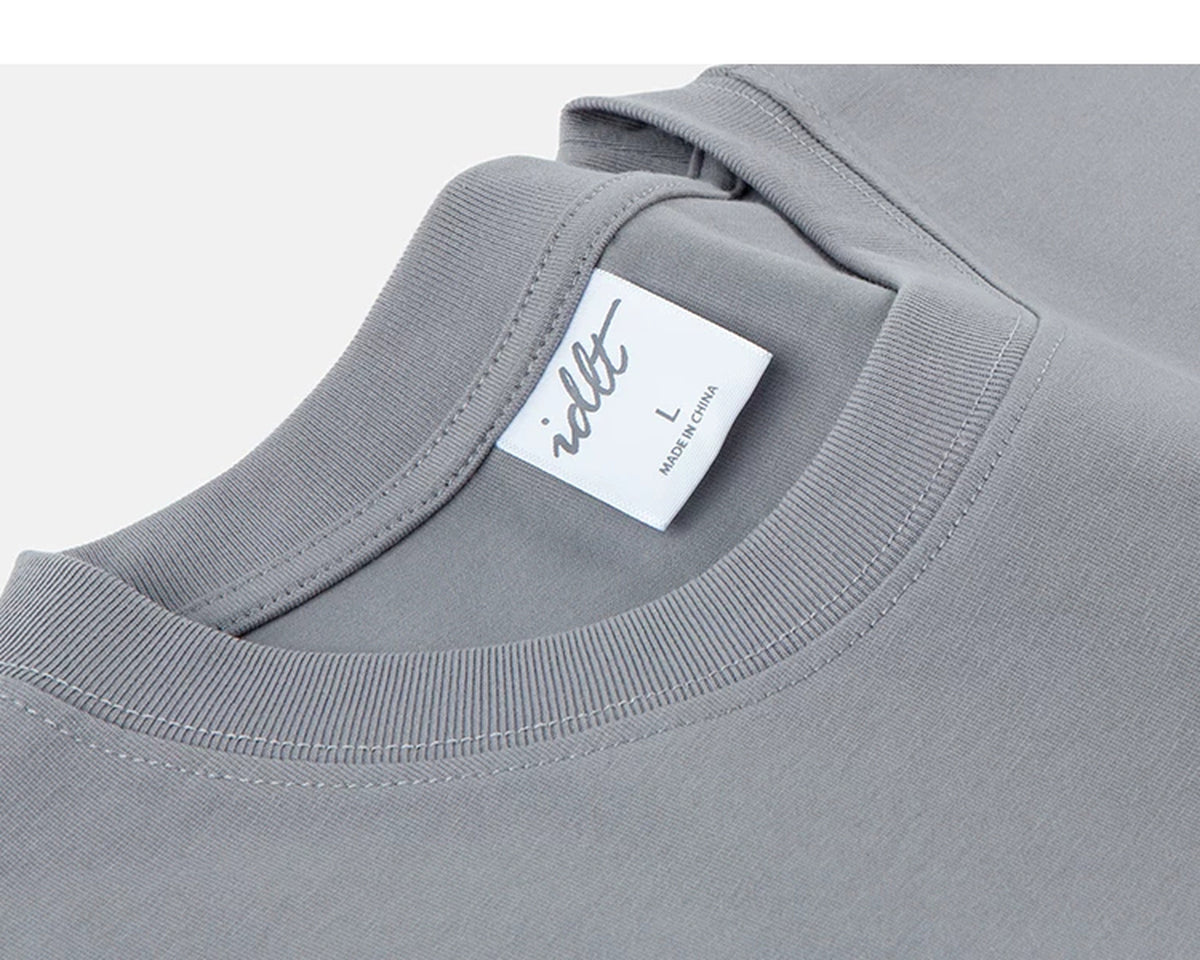 IDLT T-shirt, gray neckline and label.