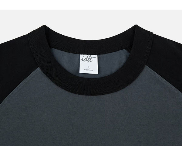 IDLT raglan T-shirt, black and dark gray crewneck.