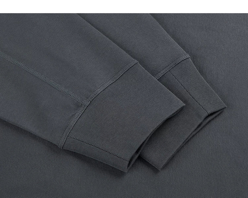 IDLT long sleeve T-shirt, dark gray ribbed cuffs.