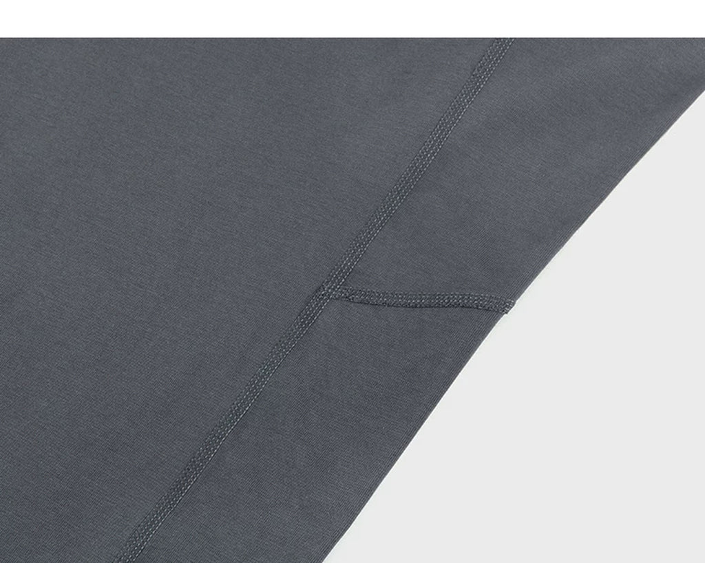 IDLT long sleeve T-shirt, dark gray side panel seam.
