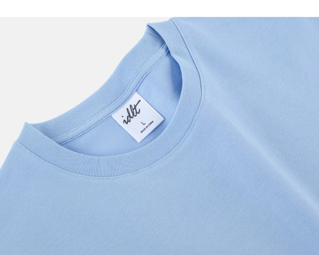 IDLT T-shirt, light blue neckline label.