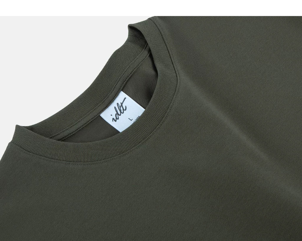 IDLT T-shirt, olive neckline label.