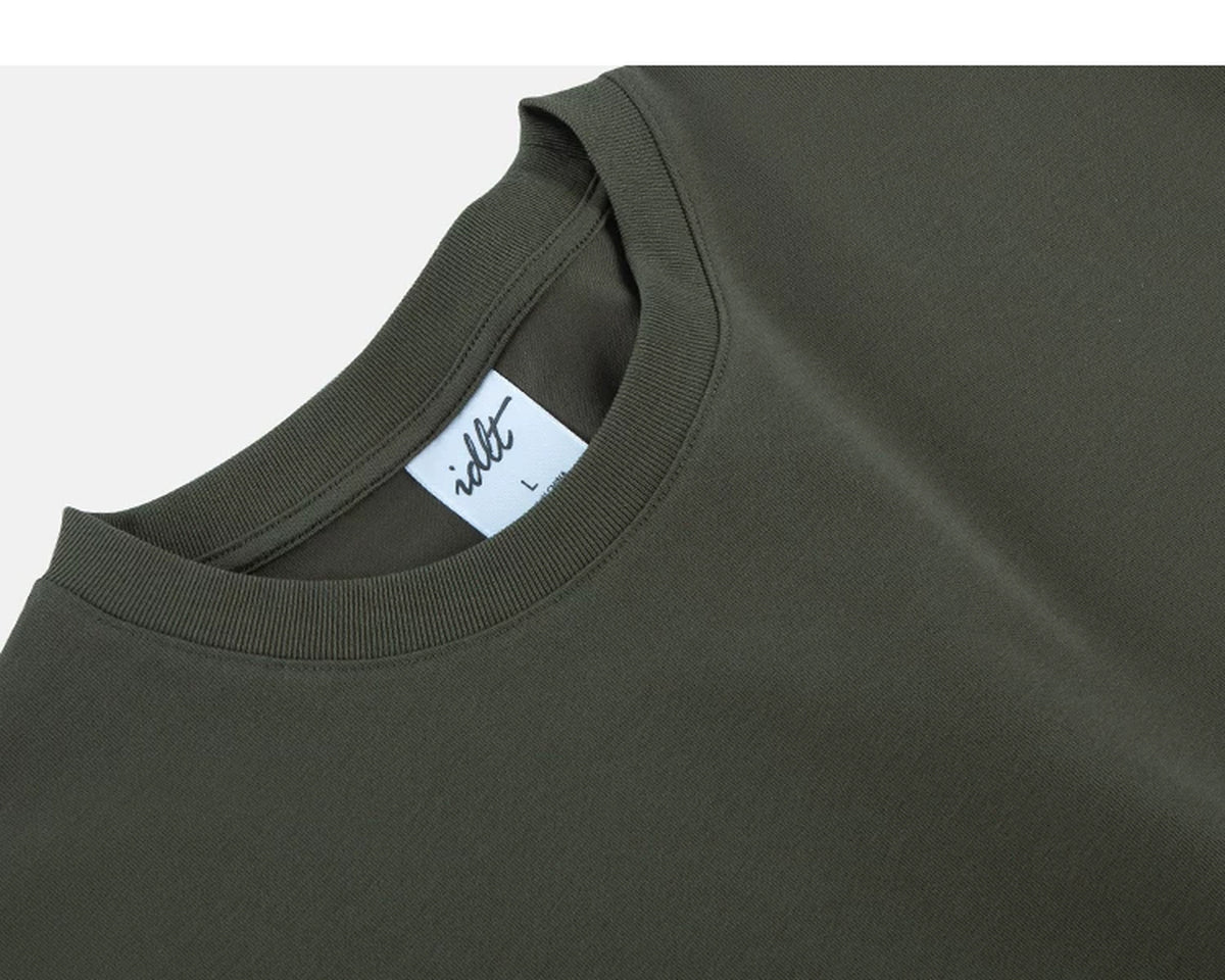 IDLT T-shirt, olive neckline label.
