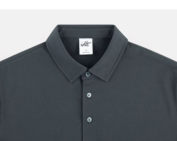 IDLT polo shirt, dark gray collar and placket.