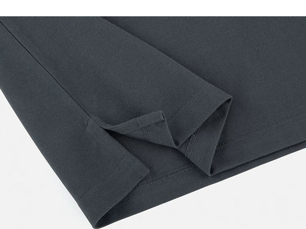 IDLT polo shirt, dark gray folded hem.