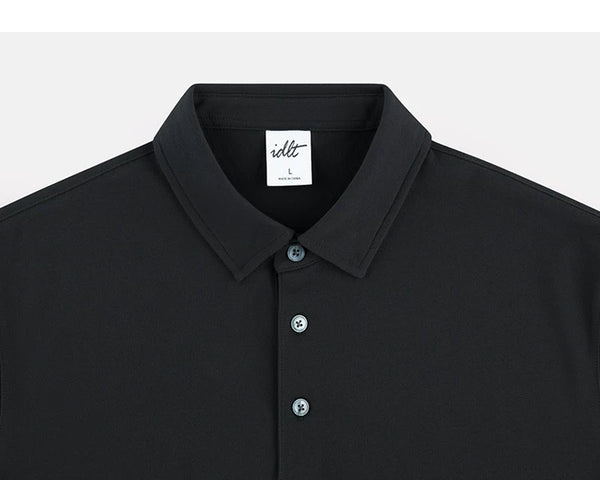 IDLT polo shirt, black collar and placket.