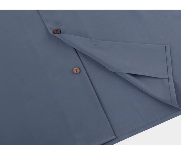 IDLT short sleeve shirt, blue gray button placket and hem.