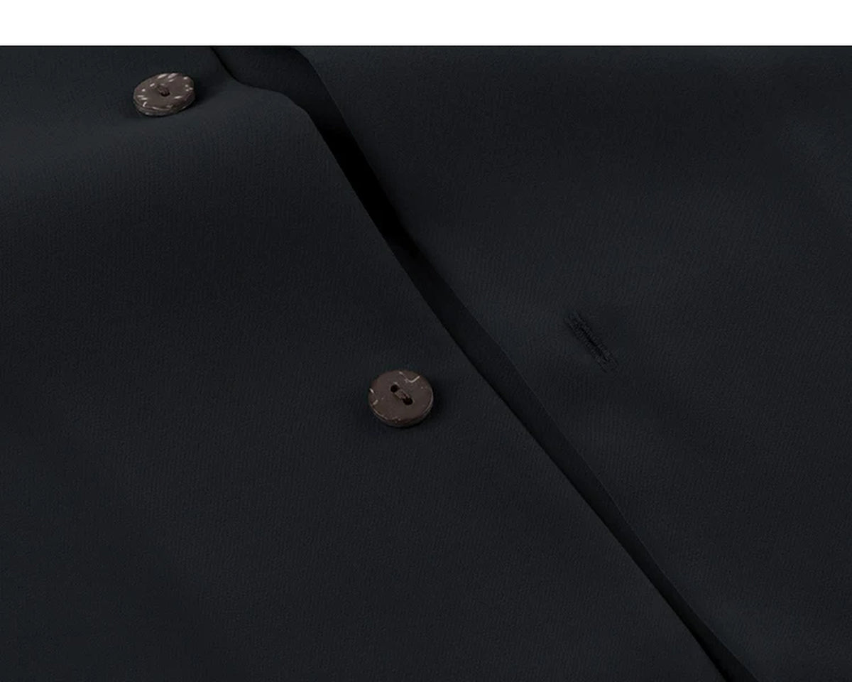 IDLT short sleeve shirt, black buttons close-up.