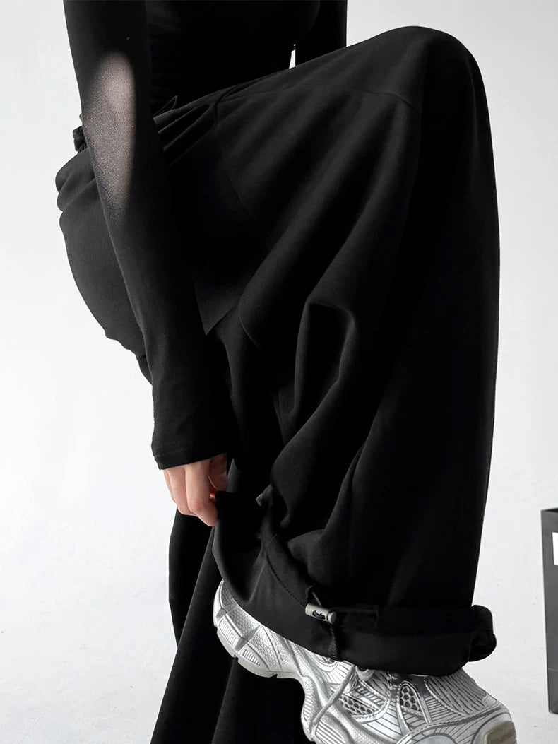 Black wide-leg sweatpants cuff detail