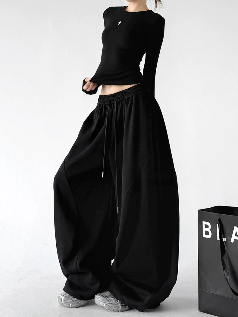 Black wide-leg pants - angled front