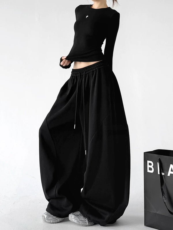 Black wide-leg pants - angled front