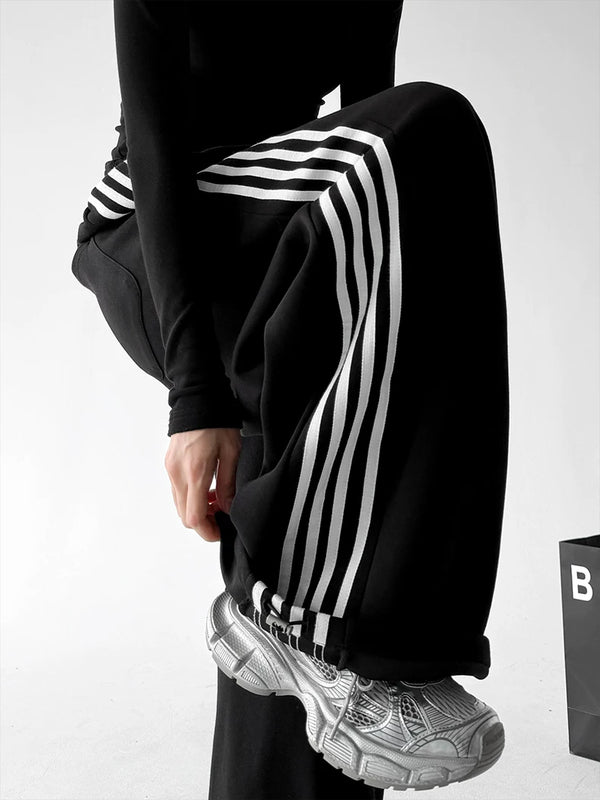 Black side-stripe wide-leg pants cuff detail - CT260