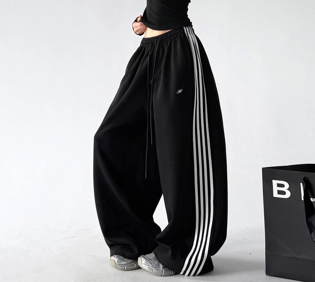 Black side-stripe wide-leg pants side - CT260