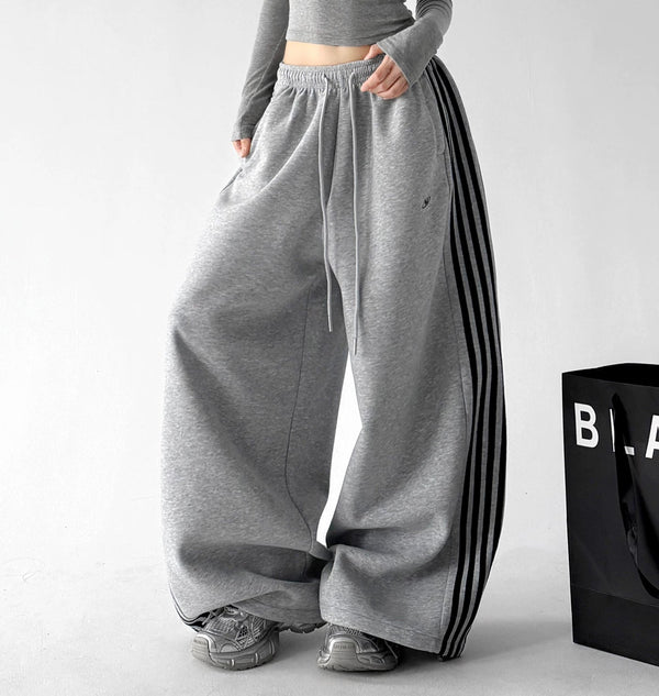 Gray side-stripe wide-leg pants angled front - CT260