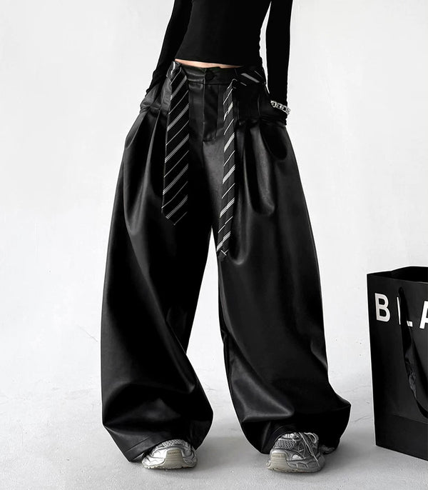 Black wide-leg PU pants angled front view - CT6267