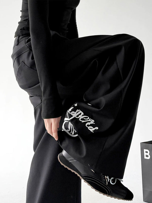 Black wide-leg pants cuff detail