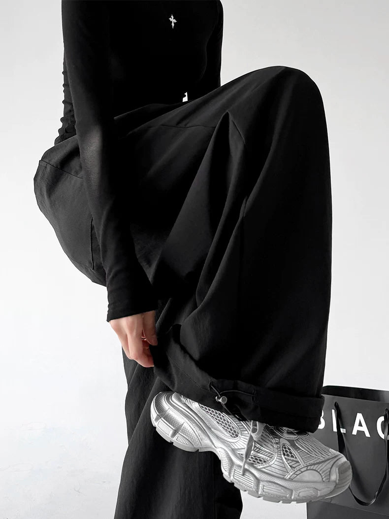 Black wide-leg pants - raised leg detail