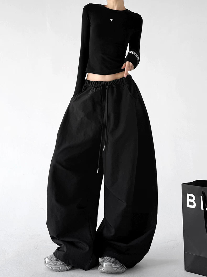 Black wide-leg pants - angled front