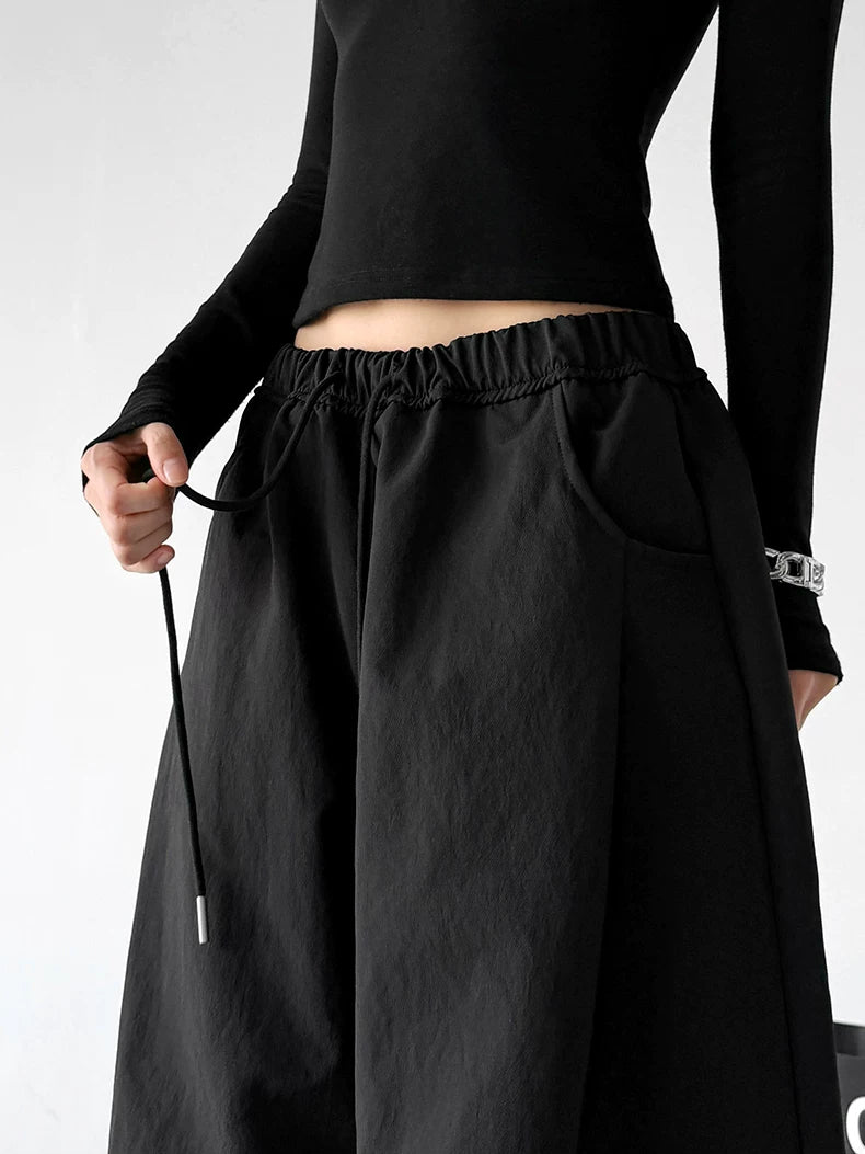 Black wide-leg pants - waist detail