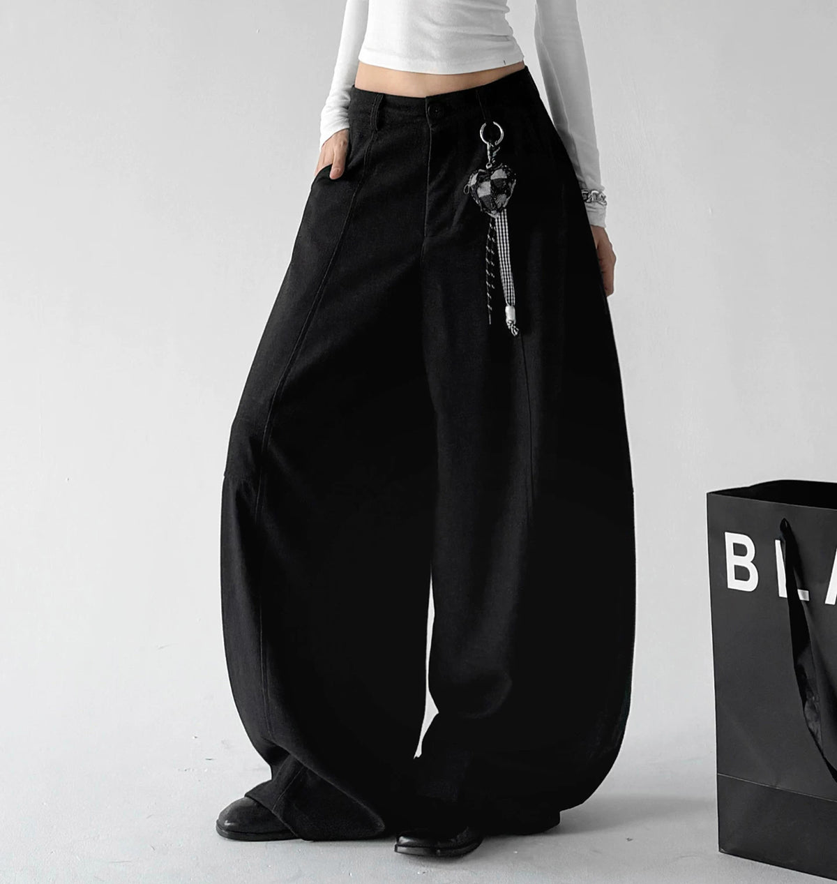 Black ruffled wide-leg pants angled front - CT6275