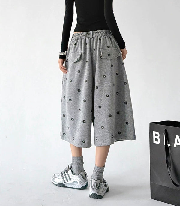 Gray wide leg pants, angled back view