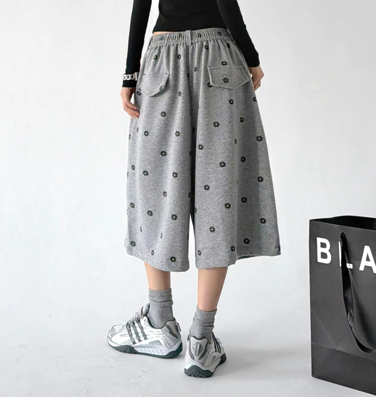 Gray wide leg pants, back view