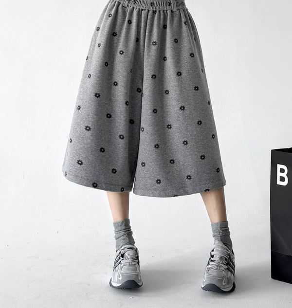 Gray wide leg pants, waist front view