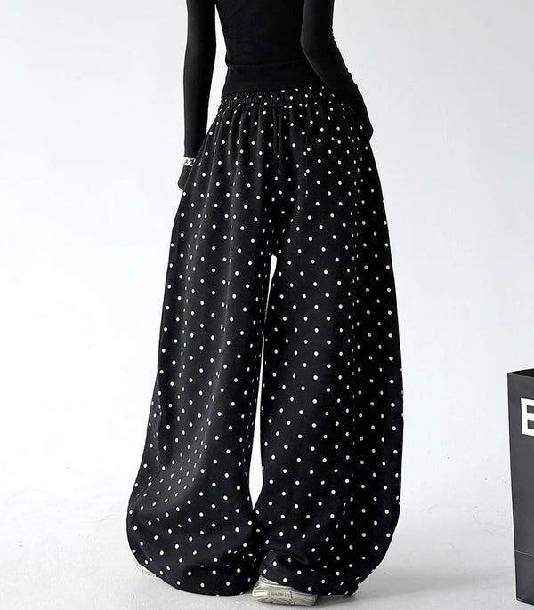 Black wide leg pants, back view