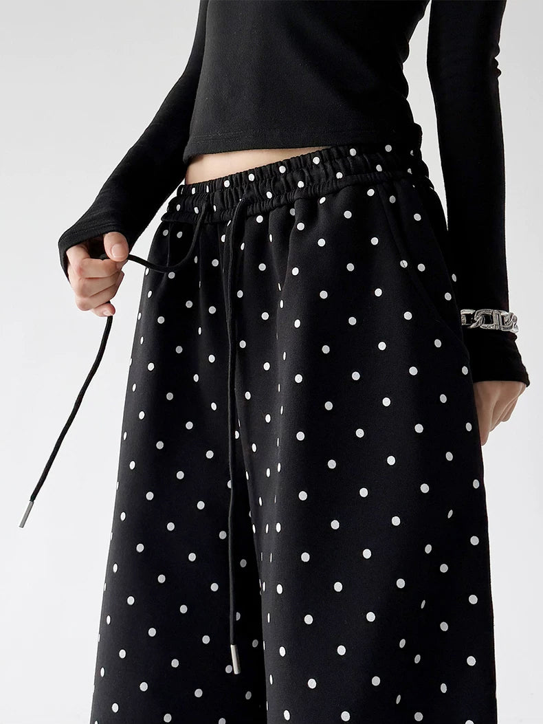 Black wide leg pants, waist detail view