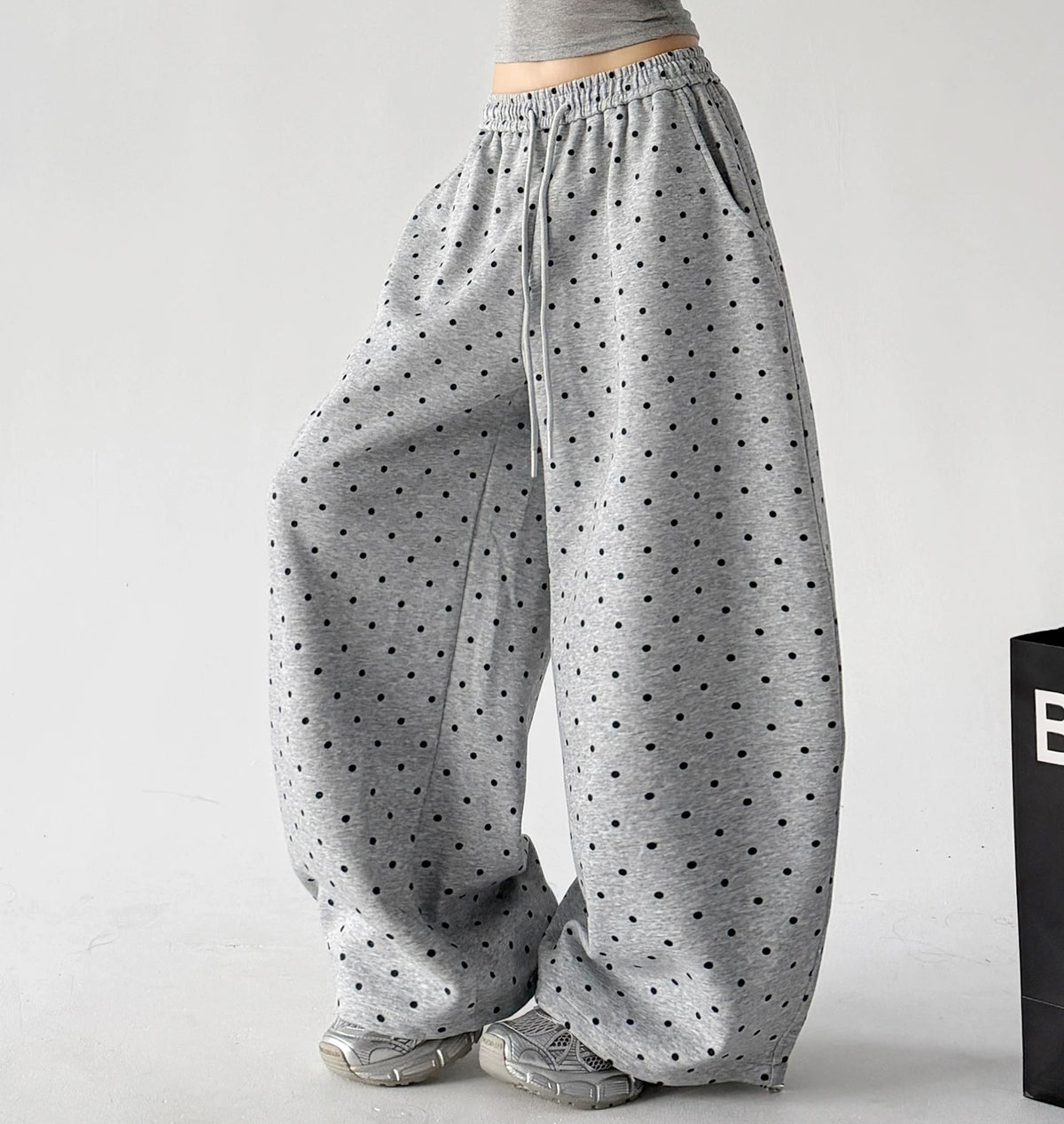 Gray wide leg pants, side view