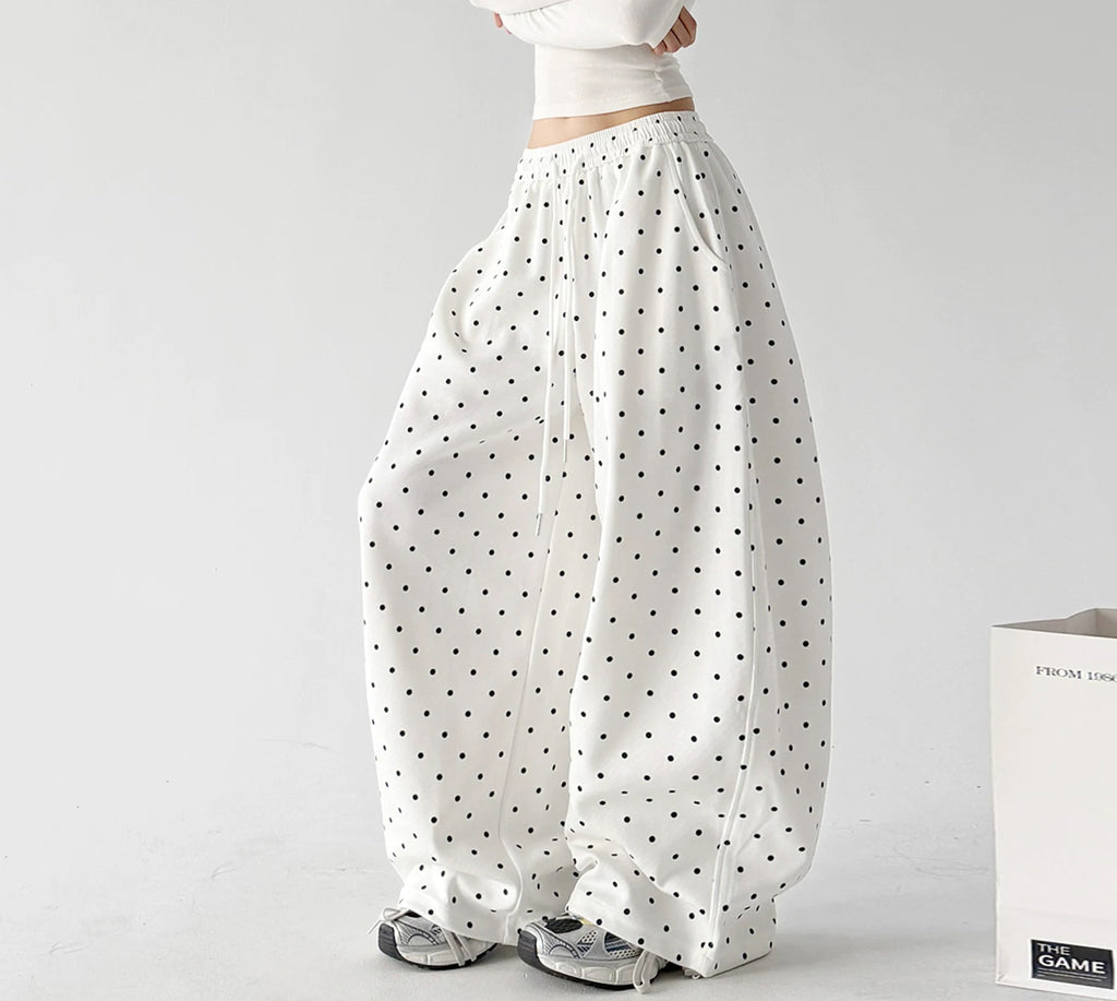 White wide leg pants, angled front view
