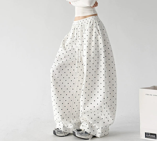 White wide leg pants, angled front view